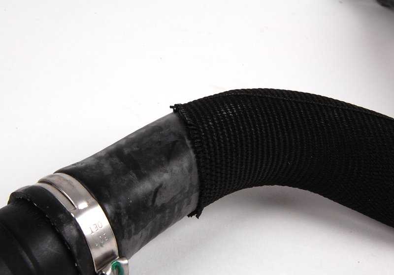 OEM pressure hose 11727556957 for BMW E60, E61, E63, E64. Part of the emission reduction system. Original BMW.
