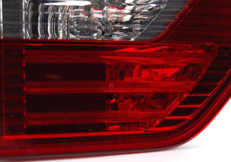 Rear tailgate left light for BMW X3 E83N (OEM 63217162213). Original BMW.