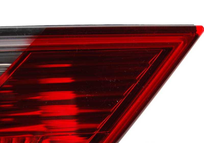 Rear tailgate left light for BMW X3 E83N (OEM 63217162213). Original BMW.
