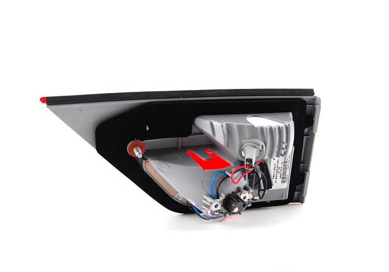 Rear tailgate left light for BMW X3 E83N (OEM 63217162213). Original BMW.