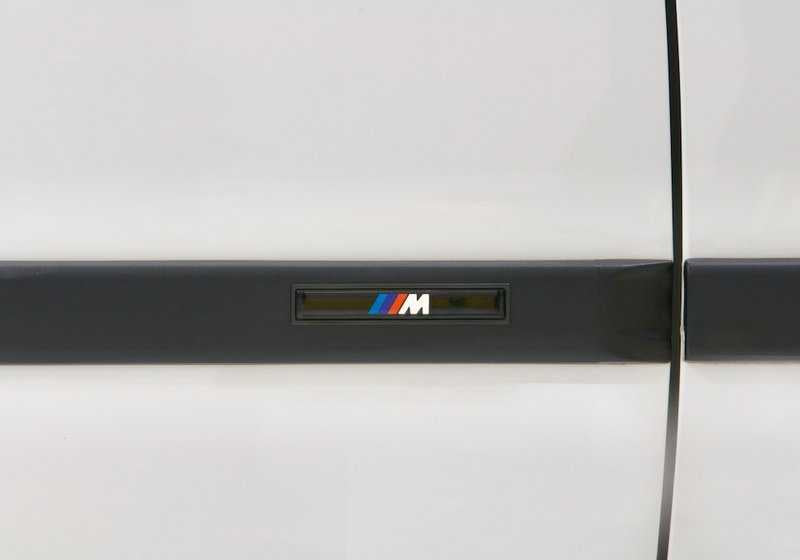 Juego de reequipamiento listones parachoques M delantero OEM 82119403140 para BMW Serie 3 E36. Original BMW.