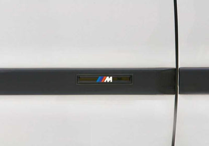Juego de reequipamiento listones parachoques M delantero OEM 82119403140 para BMW Serie 3 E36. Original BMW.