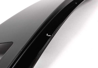 Moldura marco ventanilla puerta trasera izquierda OEM 51342695289 para BMW E46. Color negro brillante. Original BMW.