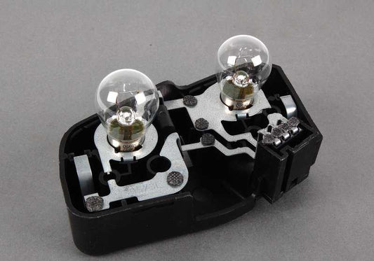 Soporte portabombillas trasero izquierdo OEM 63217165743 para BMW E46 {316i AL11, AL12, AL21, AL22, AL51, AN72, AN82, AY11, AY31, AY32}. Original BMW.