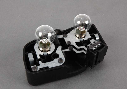 Soporte portabombillas trasero izquierdo OEM 63217165743 para BMW E46 {316i AL11, AL12, AL21, AL22, AL51, AN72, AN82, AY11, AY31, AY32}. Original BMW.