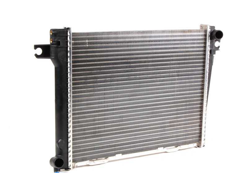 Radiador de refrigeración OEM 17111176900 para BMW E30 {320i, 323i}. Compatible con modelos de 1982 a 1991. Recambio original BMW.