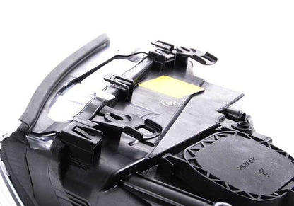 Faro delantero izquierdo Bi-Xenón AHL OEM 63127165951 para BMW E46. Original BMW.