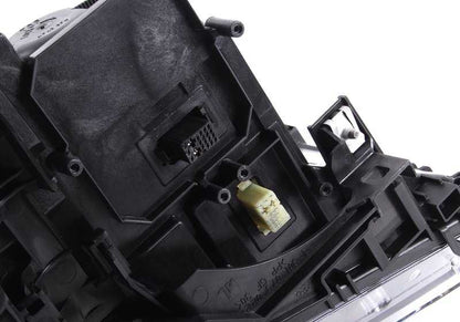 Faro delantero izquierdo Bi-Xenón AHL OEM 63127165951 para BMW E46. Original BMW.