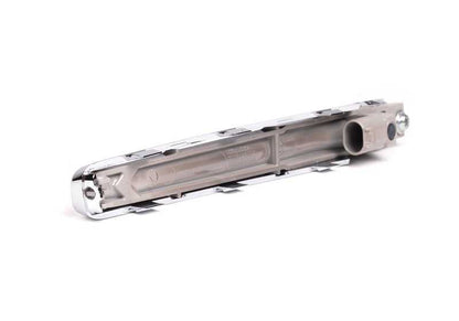 Moldura cromada lateral izquierda OEM 51138051601 para BMW E82. Original BMW.
