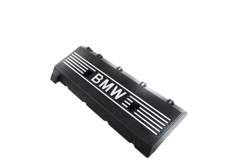 Left side cover for BMW 5 Series E39, 7 Series E38, 8 Series E31, X5 E53, Z8 E52 (OEM 11121702857). Original BMW.