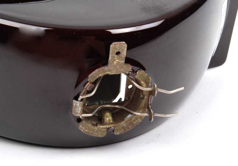 Left Headlight Insert for BMW E30, E28, E24, E23 (OEM 63171375049). Original BMW