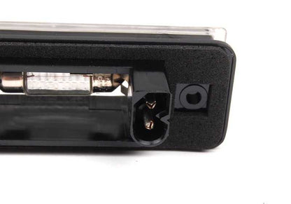 Luz de matrícula OEM 63261383049 para BMW E31. Original BMW.