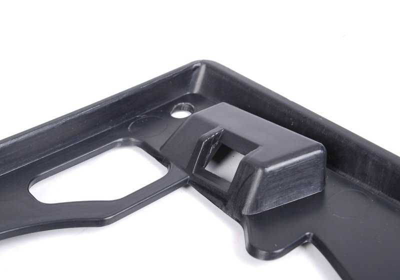 Soporte izquierdo para faro antiniebla OEM 51117906497 para BMW E90 {320i VA05, VA06, VA07, VA08, VA09, VA71, VA72, VA74, VA76, VA77}. Pieza original BMW.