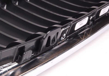 Rejilla de adorno izquierda OEM 51137201969 para BMW E90, E91 (2007-2012). Original BMW.