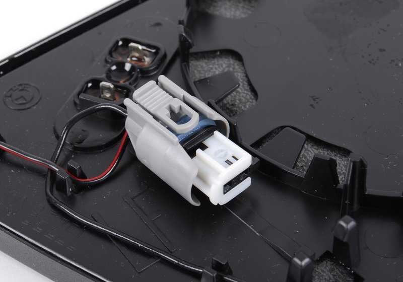 Flat left heated mirror glass for BMW E60, E61, E63, E64 (OEM 51167116747). Original BMW.