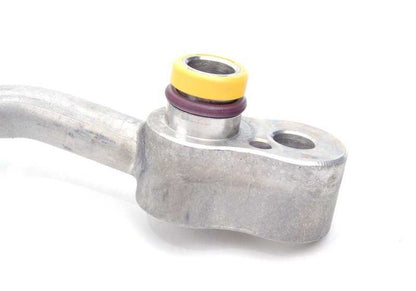 Tubería de alta presión del compresor al condensador OEM 64509181834 para BMW E60, E61, E63, E64. Compatible con modelos 540i y 550i. Repuesto original BMW.