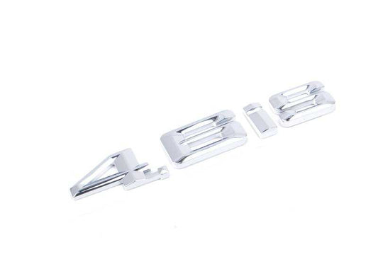 Emblem côté gauche 4.6is OEM 51147056055 pour BMW E53 X5. BMW d'origine.