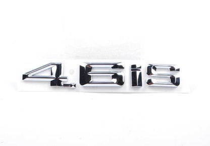 Emblema lateral izquierdo 4.6is OEM 51147056055 para BMW E53 X5. Original BMW.