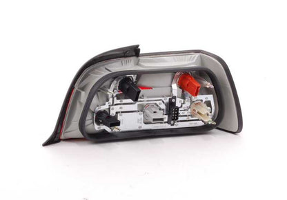 Left rear light, white indicator for BMW 3 Series E36 (OEM 82199403097). Original BMW