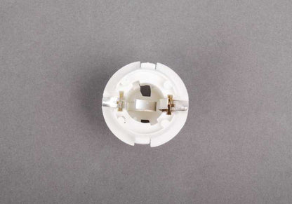 Original BMW OEM 63216943036 lamp holder for BMW E65, E66, E83, E53, E70. Compatible with all listed models.