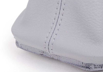 Recubrimiento de palanca de cambios en cuero gris titanio OEM 25111434531 para BMW Serie 3 E46. Original BMW.