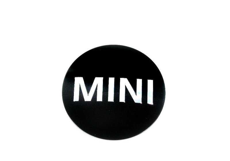 Placa para llanta OEM 36136758687 para MINI R50, R53, R56, Clubman R55, Cabrio R52, Coupé R58, Roadster R59, Countryman R60, Paceman R61... y más. Original MINI.