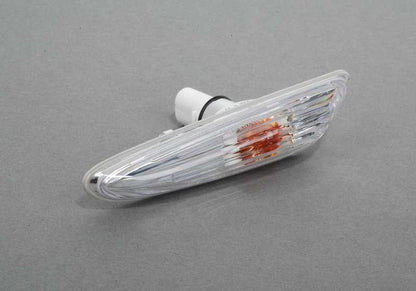 White left additional indicator light for BMW E83, E83N (OEM 63133418447). Original BMW.