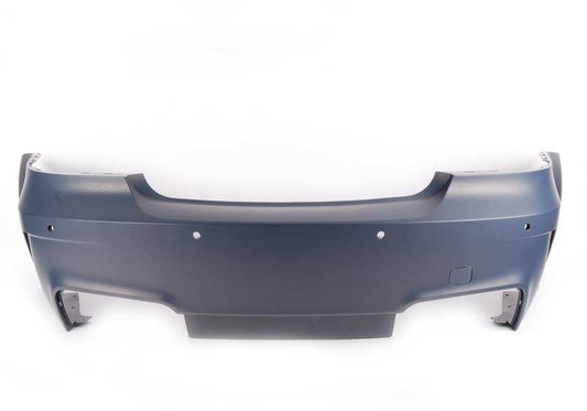 Parachoques trasero imprimado OEM 51128053878 para BMW E82. Compatible con sensores de aparcamiento (PDC). Original BMW.