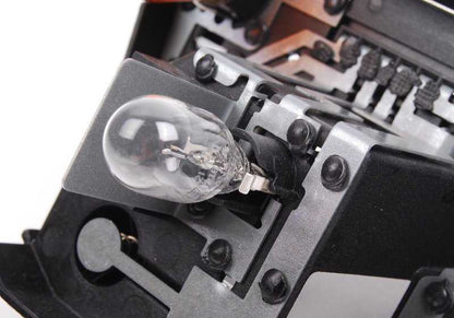 Soporte portabombillas luz trasera lateral izquierda OEM 63217174407 para BMW E92. Original BMW.