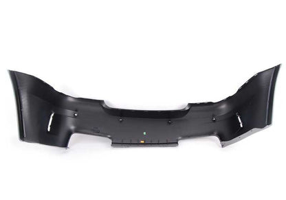 Parachoques trasero imprimado OEM 51128053878 para BMW E82. Compatible con sensores de aparcamiento (PDC). Original BMW.