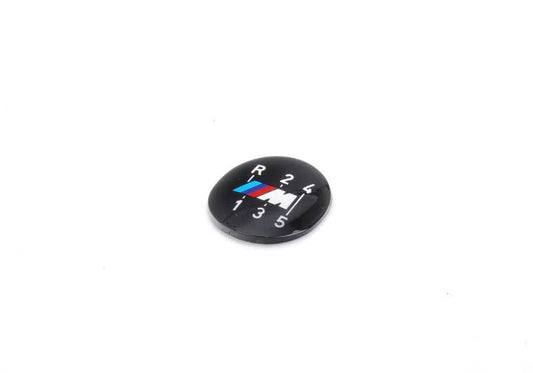Emblema adhesivo OEM 25111221616 para BMW E30, E28, E24. Compatible con modelos con cambio manual de 5 velocidades. Original BMW.
