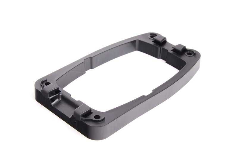 Estrutura decorativa Console central OEM 51169155987 Para BMW E60 {520d, 520i} (2007-2009). Compatível com versões a diesel e gasolina, mudança manual e automática. BMW original.