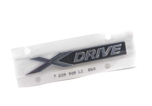 Emblema "Schriftzug" lateral izquierdo OEM 51147229909 para BMW E60, E61. Original BMW.