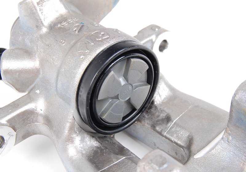 Pinza de freno trasera derecha OEM 34216785612 para MINI R55, R56, R57, R58, R59. Compatible con versiones Cooper y One. Instalación en sistema de freno trasero. Original MINI.