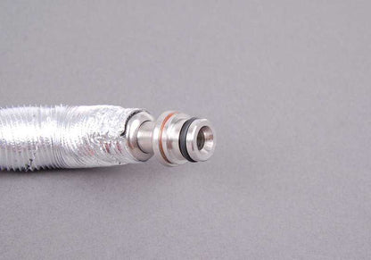 Tubo de retorno refrigeración del turbo OEM 11537558900 para BMW E82, E88, E90, E90N, E91, E91N, E92, E92N, E93, E93N, E60N, E61N, F01, F02, E71, E89. Original BMW.