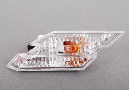 White right side indicator auxiliary light for BMW E63, E63N, E64, E64N (OEM 63137165810). Original BMW.