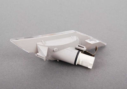 White right side indicator auxiliary light for BMW E63, E63N, E64, E64N (OEM 63137165810). Original BMW.