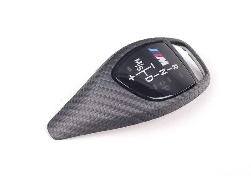 Embellecedor M Performance carbono OEM 61312250698 para BMW F20, F21, F22, F23, F30, F31, F34, F35, F32, F33, F36, F25, F26 con cambio automático deportivo. Original BMW.