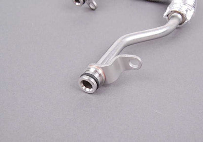 Tubo de retorno de refrigeración turbo OEM 11537558903 para BMW E82, E88, E90, E90N, E91, E91N, E92, E93, E60N, E61N, E89. Original BMW.
