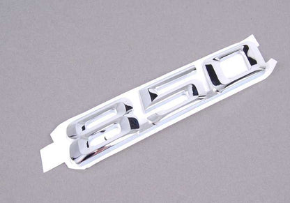 Emblema trasero adhesivo OEM 51148108850 para BMW Serie 8 E31 850Ci (modelos EG11, EG12, EG13, EG18, EG21, EG22, EG23, EG28). Original BMW.