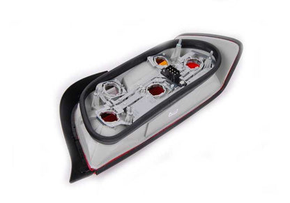 Left rear pilot with Tiniebla light OEM 63218353285 for BMW E36. Original BMW.