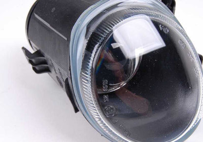 Left fog light for BMW X5 E53 (OEM 63178409025). Original BMW