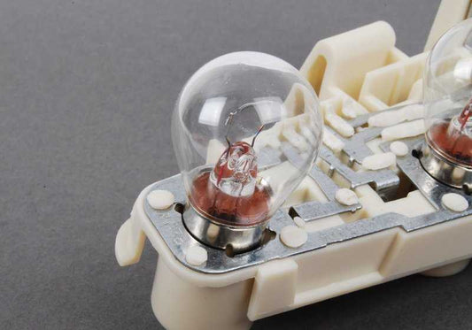 Portalámpara luz trasera lateral izquierda OEM 63216937473 para BMW Serie 3 E90 (316i, 318d). Original BMW.
