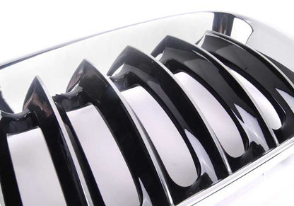 Front left decorative grille for BMW X3 E83, E83N (OEM 51133414903). Original BMW