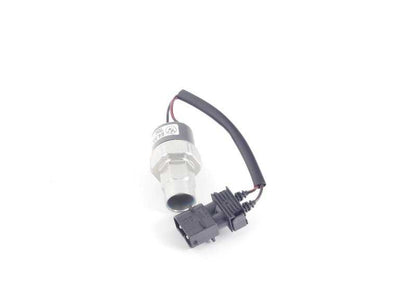 Interruptor de presión A/C OEM 64538390971 para BMW E30. Compatible con sistemas R12/R134A. Recambio original BMW.