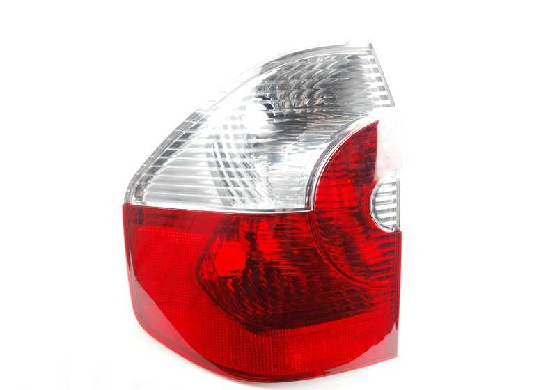 White left side panel rear light for BMW X3 E83 (OEM 63213404103). Original BMW.