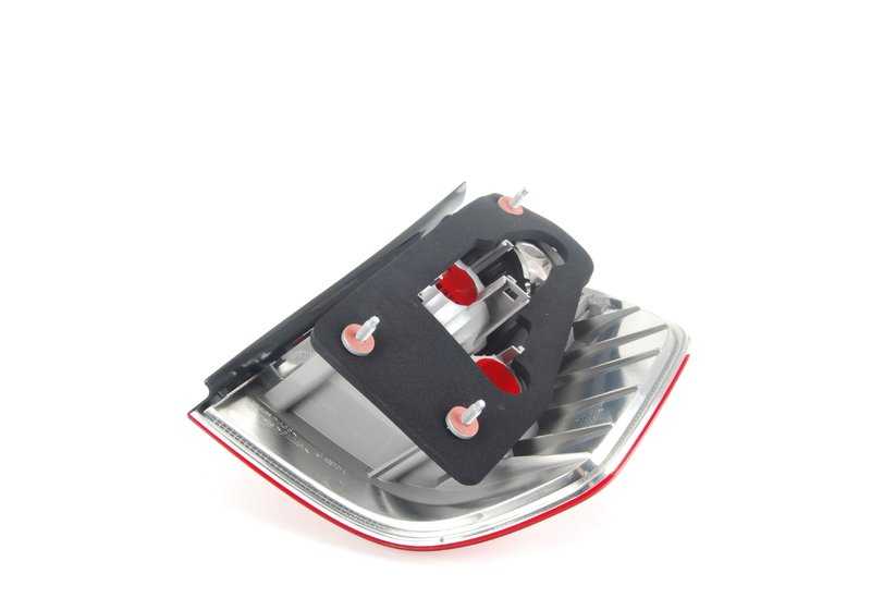 White left side panel rear light for BMW X3 E83 (OEM 63213404103). Original BMW.