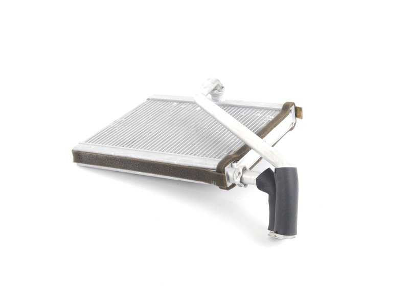 Radiador calefacción OEM 64118385689 para BMW E39 y E53. Compatible con modelos como 520d, 520i. Repuesto original BMW.