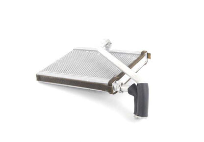 Radiador calefacción OEM 64118385689 para BMW E39 y E53. Compatible con modelos como 520d, 520i. Repuesto original BMW.