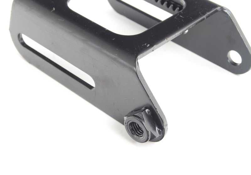 Soporte tensor alternador OEM 12311734462 para BMW E30, E36, E34. Pieza original BMW.